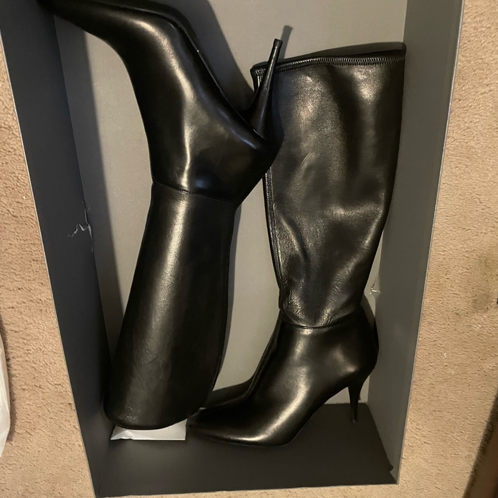 Prada NEVER WORN. Black leather boots.